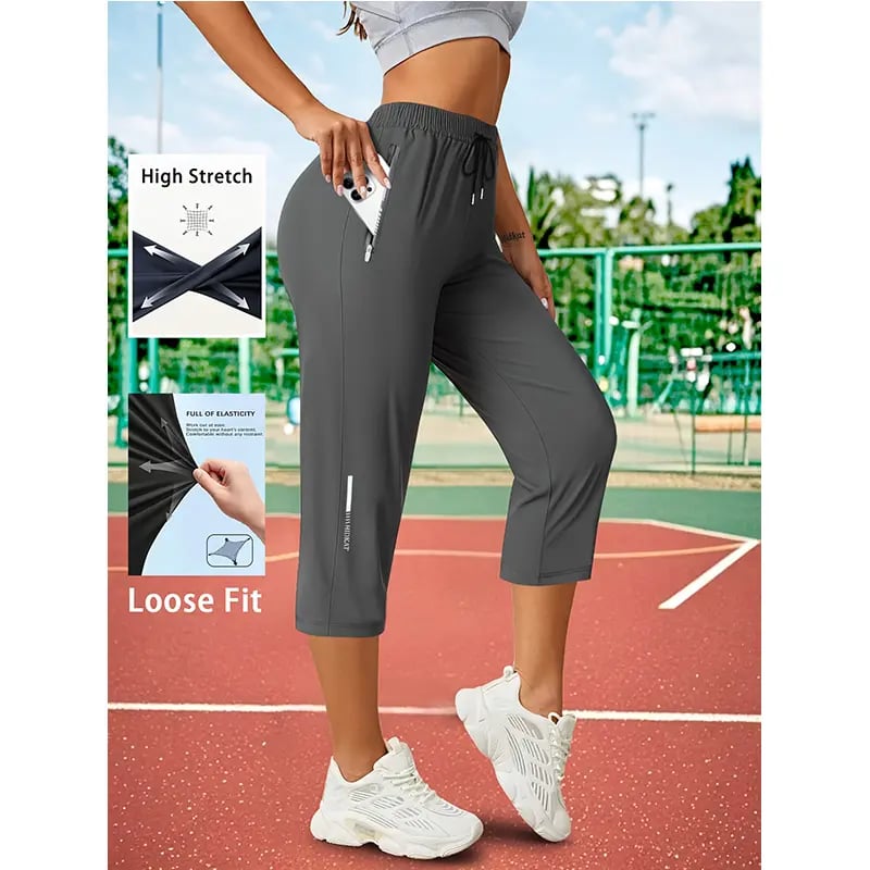 Women's Capri Pants – Loose Fit. Summer Drawstring Waist. Zipper Pockets. Breathable High-Stretch Fabric. Suitable for Everyday Wear