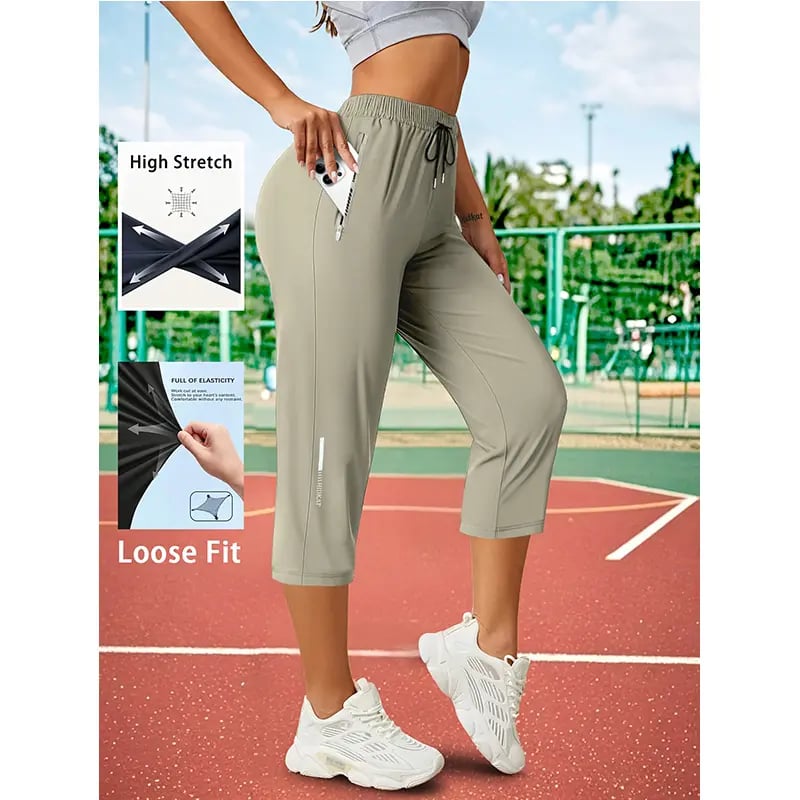 Women's Capri Pants – Loose Fit. Summer Drawstring Waist. Zipper Pockets. Breathable High-Stretch Fabric. Suitable for Everyday Wear