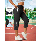 Women's Capri Pants – Loose Fit. Summer Drawstring Waist. Zipper Pockets. Breathable High-Stretch Fabric. Suitable for Everyday Wear