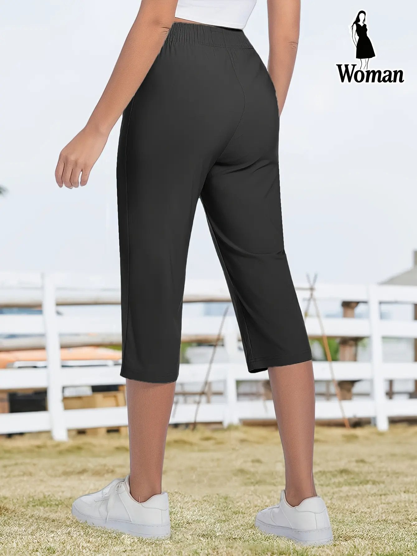 Women's Capri Pants – Loose Fit. Summer Drawstring Waist. Zipper Pockets. Breathable High-Stretch Fabric. Suitable for Everyday Wear